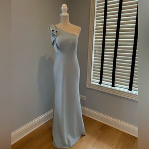 Floor length light blue one shoulder Azazie dress with ruffle accent